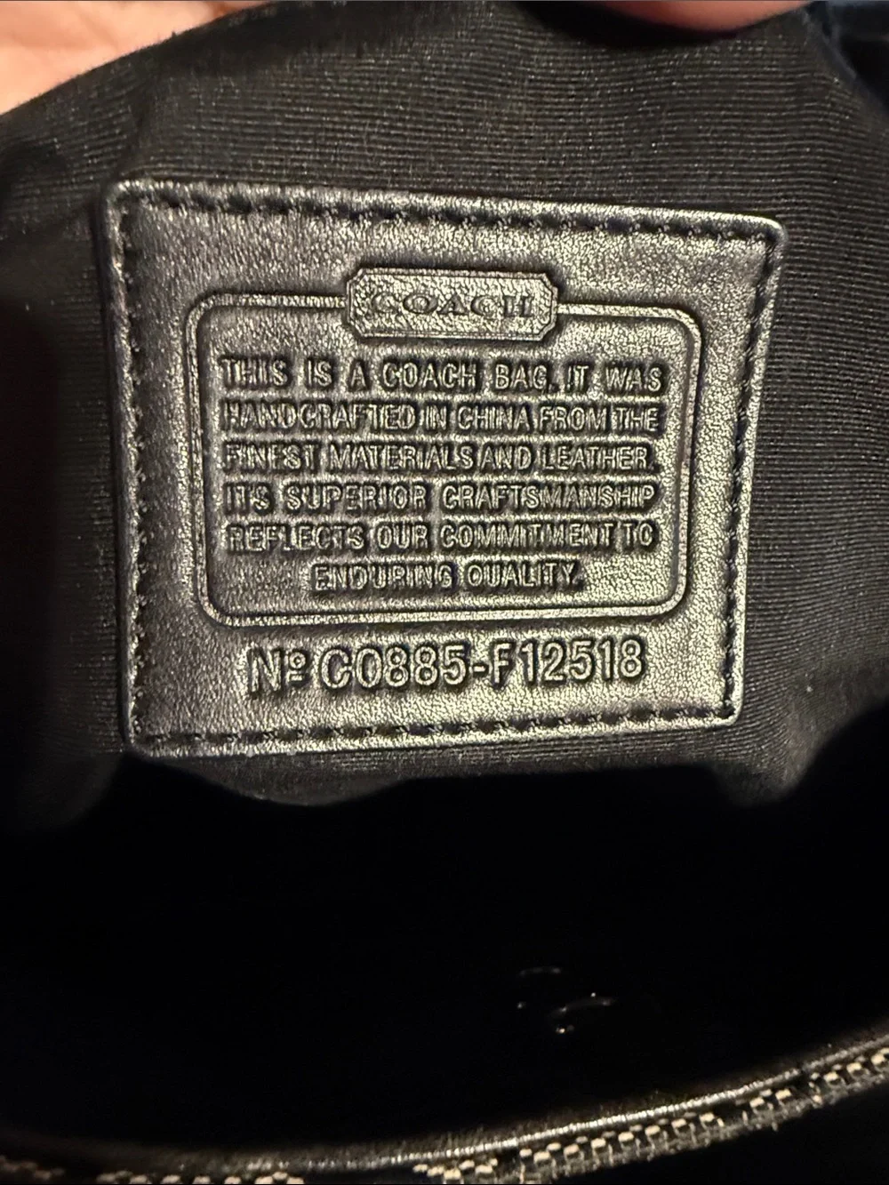 Coach Black Leather Men’s Wallet with Embossed Brand Patch